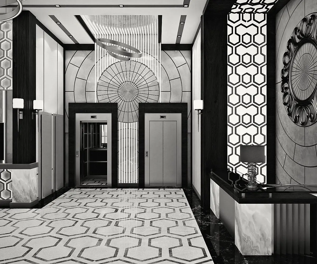 The lift lobby: mashrabiya, stone and a timber sunburst.