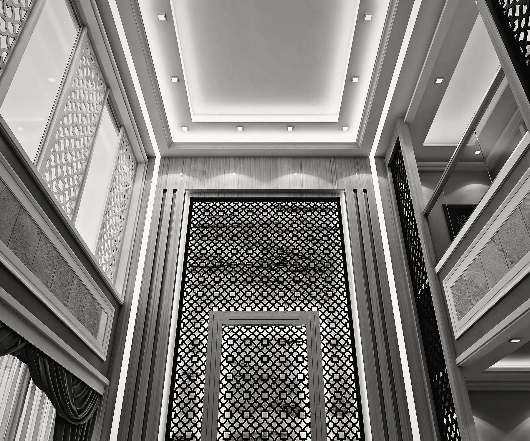 Looking up: a stepped ceiling with hidden lighting.